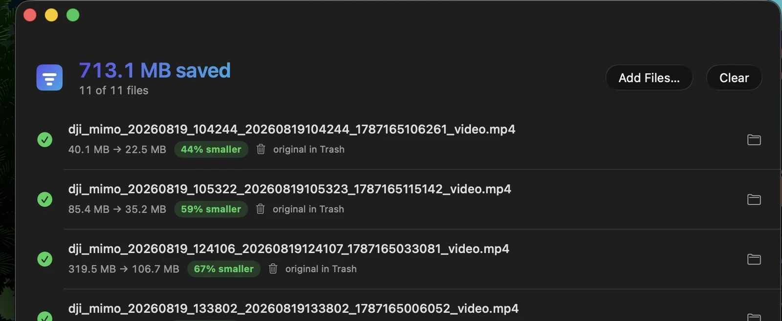 The Ounce window part way through a batch, showing 713.1 MB saved across 11 of 11 files, with each file listed at 44%, 59% and 67% smaller