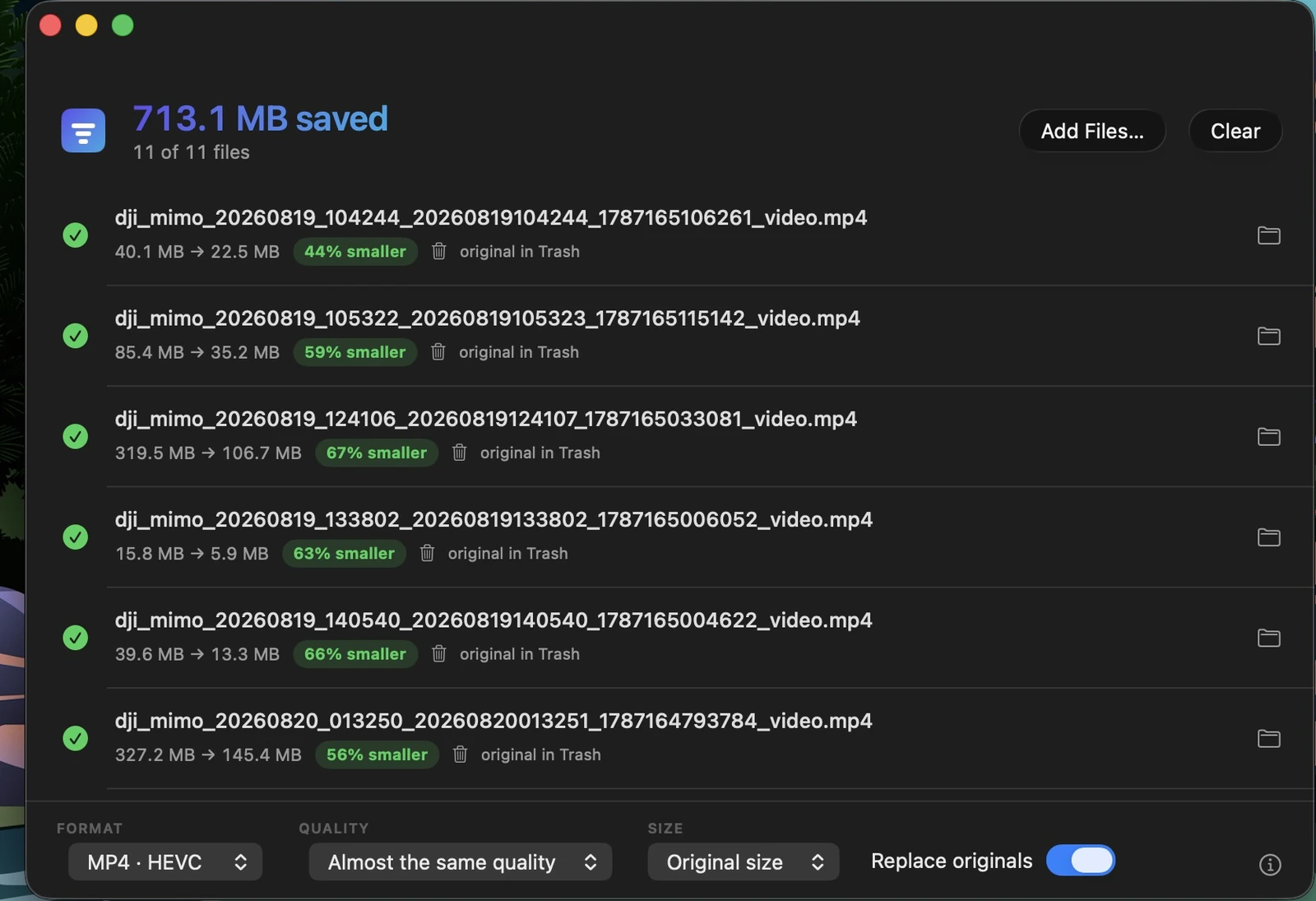 Ounce having finished eleven files, showing 713.1 MB saved and each file between 44% and 67% smaller